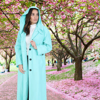 Mint hooded raincoat with Agnes Bonaventura Embroidery